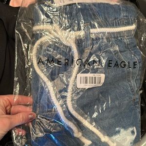 American Eagle HR Jean shorts with white tie